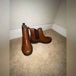 Dark brown pleather booties.